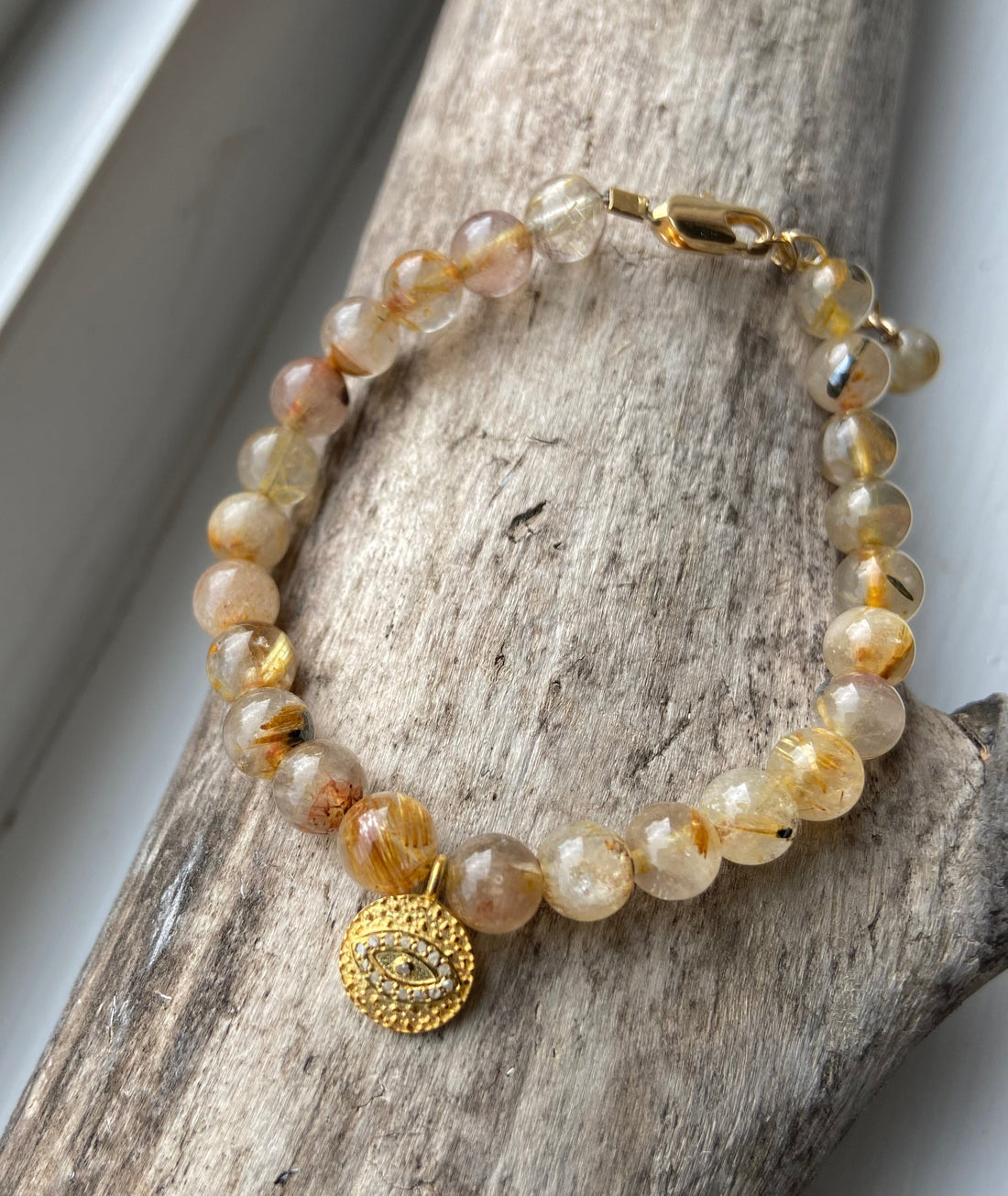 Golden Rutilated Quartz Bracelet with White Diamond Pavé Evil Eye Charm