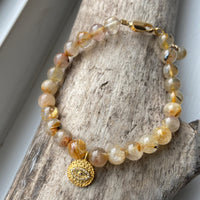 Golden Rutilated Quartz Bracelet with White Diamond Pavé Evil Eye Charm