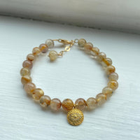 Golden Rutilated Quartz Bracelet with White Diamond Pavé Evil Eye Charm